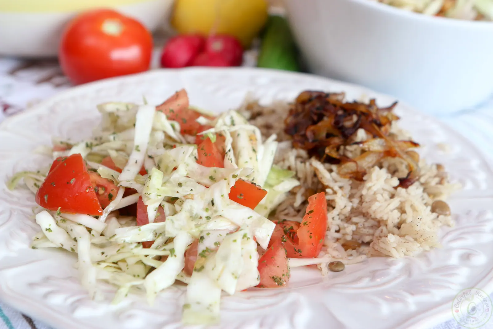 Lebanese lentil rice pilaf (mdardara) with caramelized onions and cabbage tomato salad