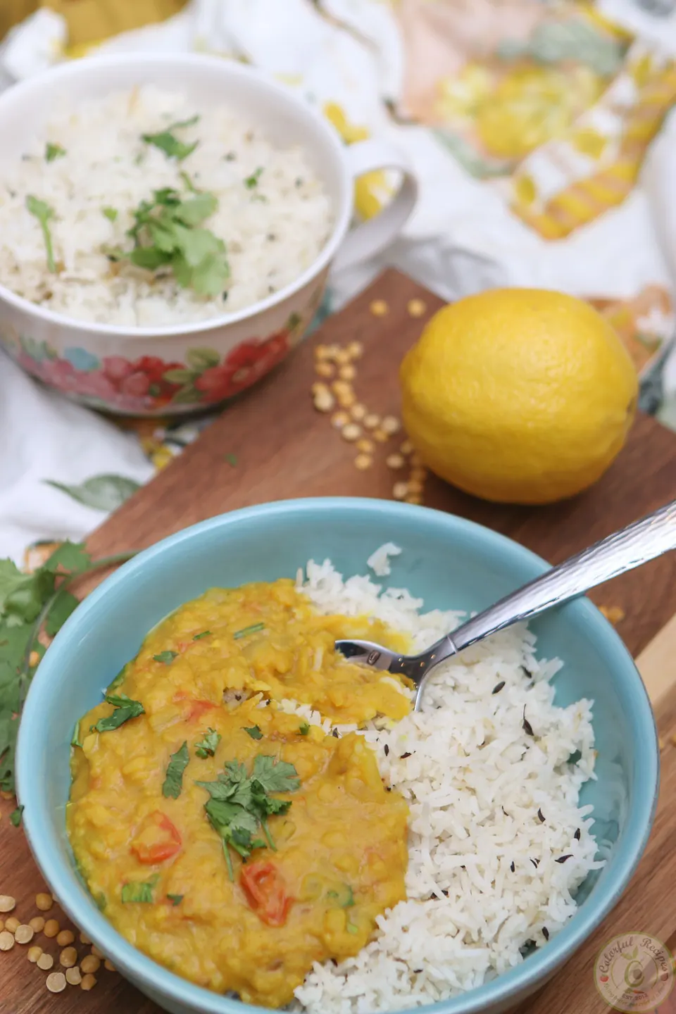 Bowl of buttery Instant Pot pigeon pea dal served over rice