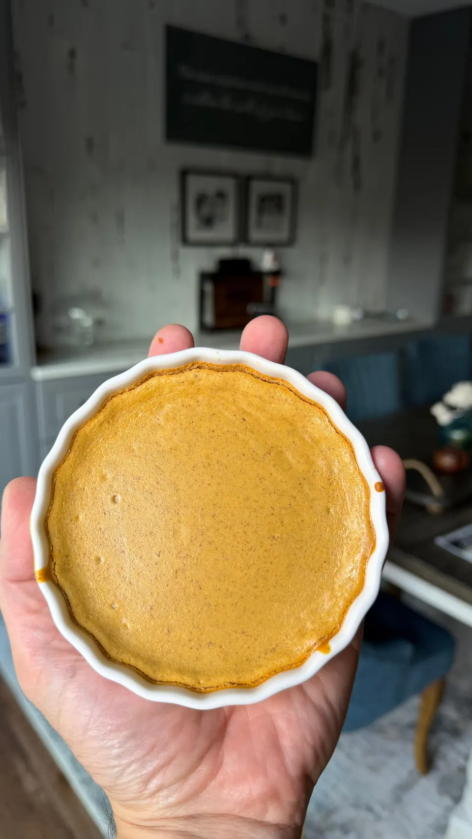 Healthy high-protein cottage cheese pumpkin pie baked golden in a fluted ramekin